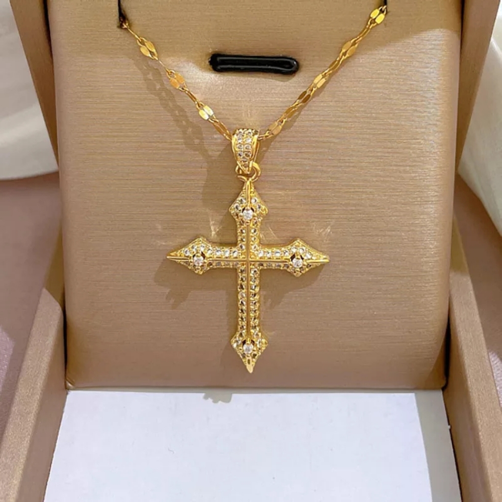 Golden guardian crystal cross.